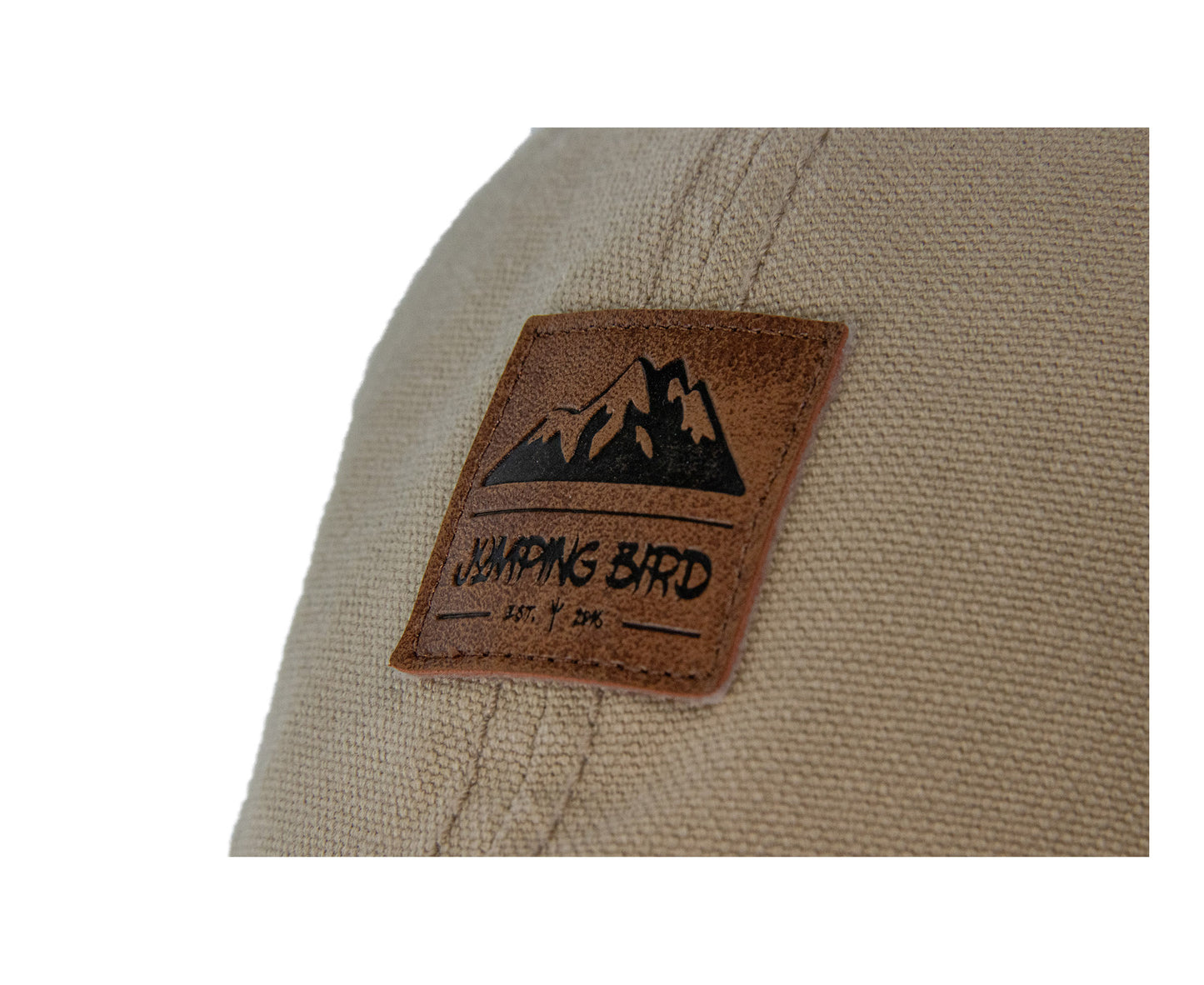 Dad Hat von Jumping Bird in Beige mit geprägtem Lederoptik-Patch vorn und weicher, unverstärkter Passform für hohen Tragekomfort