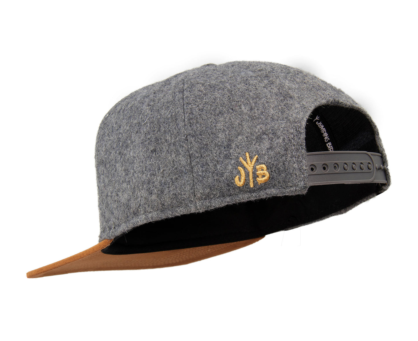 Filz-Snapback von Jumping Bird in Steingrau-Braun mit geprägtem Lederoptik-Patch vorn und seitlichem Logostick
