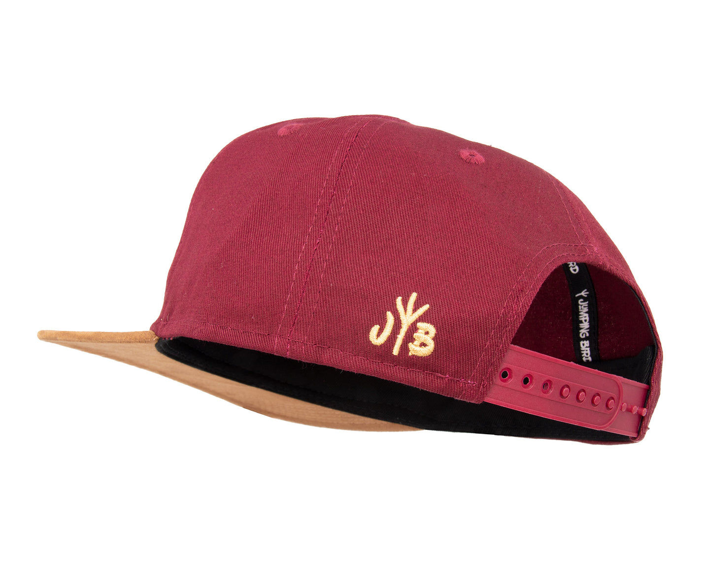 Snapback-Cap von Jumping Bird in Bordeaux-Braun mit geprägtem Lederoptik-Patch vorn und seitlichem Logostick