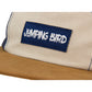 5-Panel-Cap von Jumping Bird in Navy-Beige mit sportivem Frontpatch und weicher, unverstärkter Passform für hohen Tragekomfort