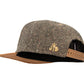 Snapback-Cap von Jumping Bird in Tweed-Braun mit geprägtem Lederoptik-Patch vorn und seitlichem Logostick