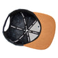 Snapback-Cap von Jumping Bird in Anthrazitblau-Braun mit geprägtem Lederoptik-Patch vorn und seitlichem Logostick