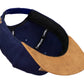 Snapback-Cap von Jumping Bird in Blau-Braun mit geprägtem Lederoptik-Patch vorn und seitlichem Logostick