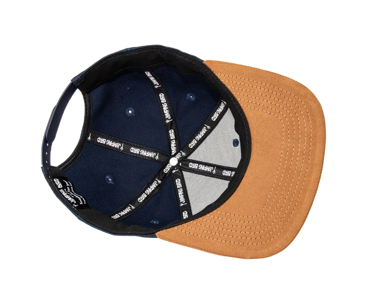 Snapback-Cap von Jumping Bird in Ozeanblau-Braun mit geprägtem Lederoptik-Patch vorn und seitlichem Logostick