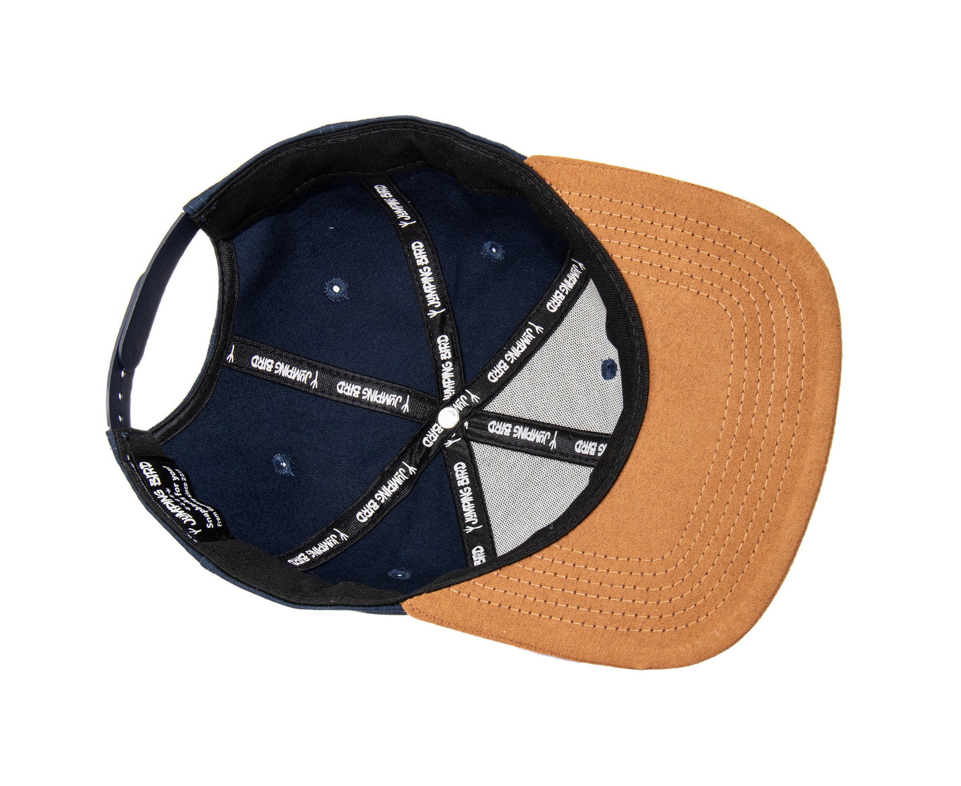 Snapback-Cap von Jumping Bird in Ozeanblau-Braun mit geprägtem Lederoptik-Patch vorn und seitlichem Logostick