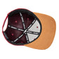 Filz-Snapback von Jumping Bird in Dunkelrot-Braun mit geprägtem Lederoptik-Patch vorn und seitlichem Logostick