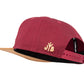 Snapback-Cap von Jumping Bird in Bordeaux-Braun mit geprägtem Lederoptik-Patch vorn und seitlichem Logostick
