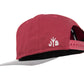 Snapback-Cap von Jumping Bird in Bordeaux-Grau mit geprägtem Lederoptik-Patch vorn und seitlichem Logostick