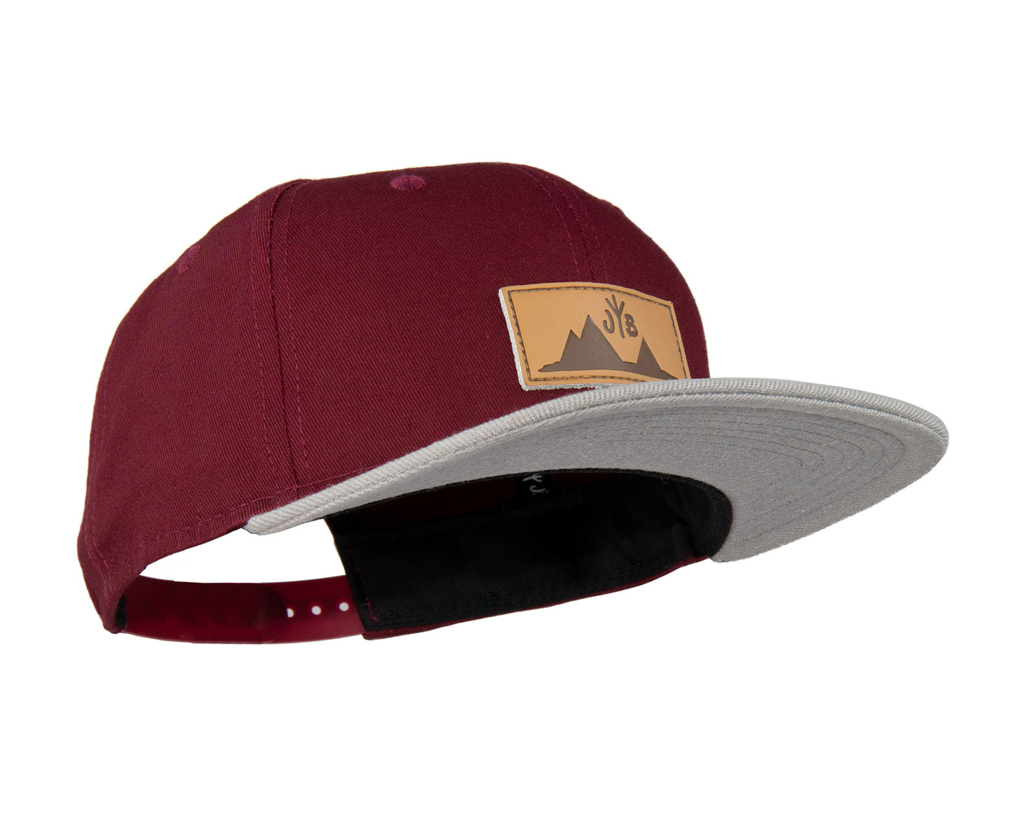 Snapback-Cap von Jumping Bird in Bordeaux-Grau mit geprägtem Lederoptik-Patch vorn und seitlichem Logostick