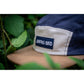 5-Panel-Cap von Jumping Bird in Navy-Beige mit sportivem Frontpatch und weicher, unverstärkter Passform für hohen Tragekomfort